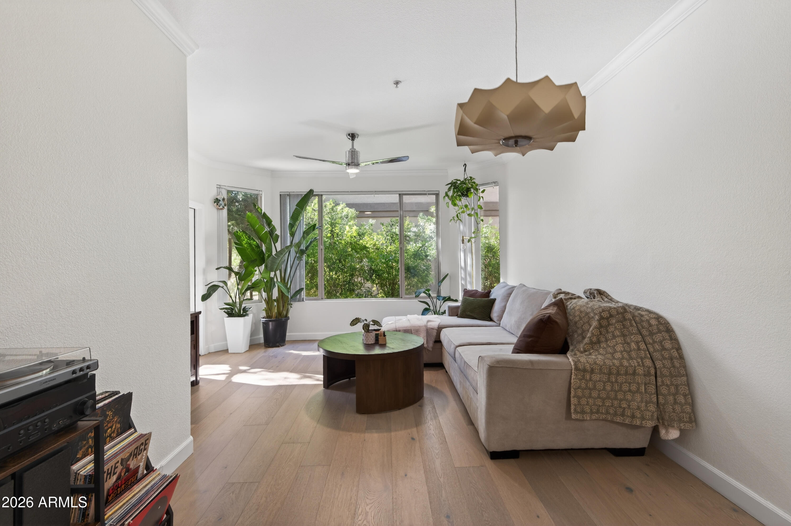 435 West Rio Salado Parkway, Unit 112 Tempe, AZ 85281 - Photo 12 of 38 a living room with furniture and a large window