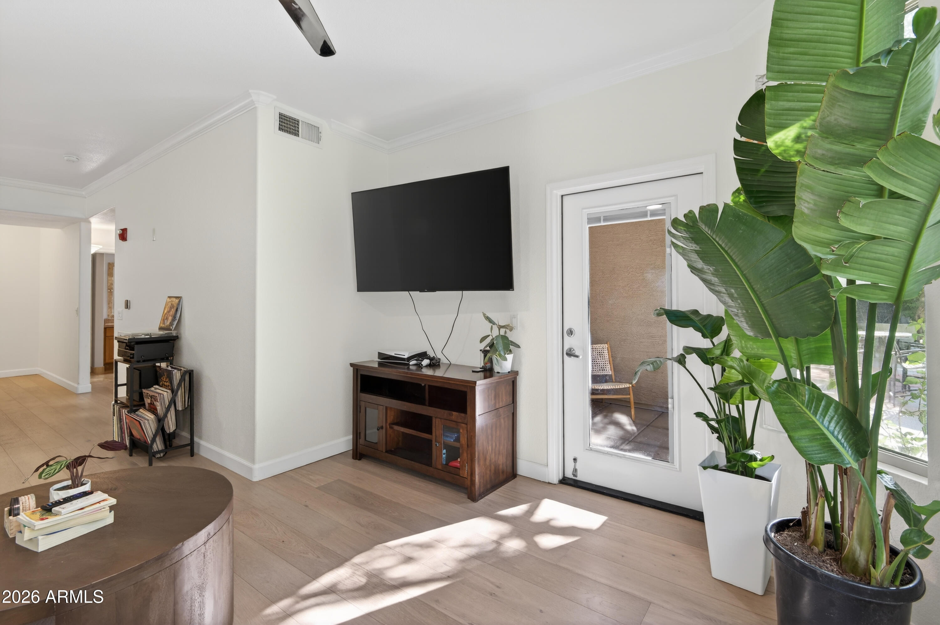 435 West Rio Salado Parkway, Unit 112 Tempe, AZ 85281 - Photo 15 of 38 a view of a livingroom with furniture and a flat screen tv