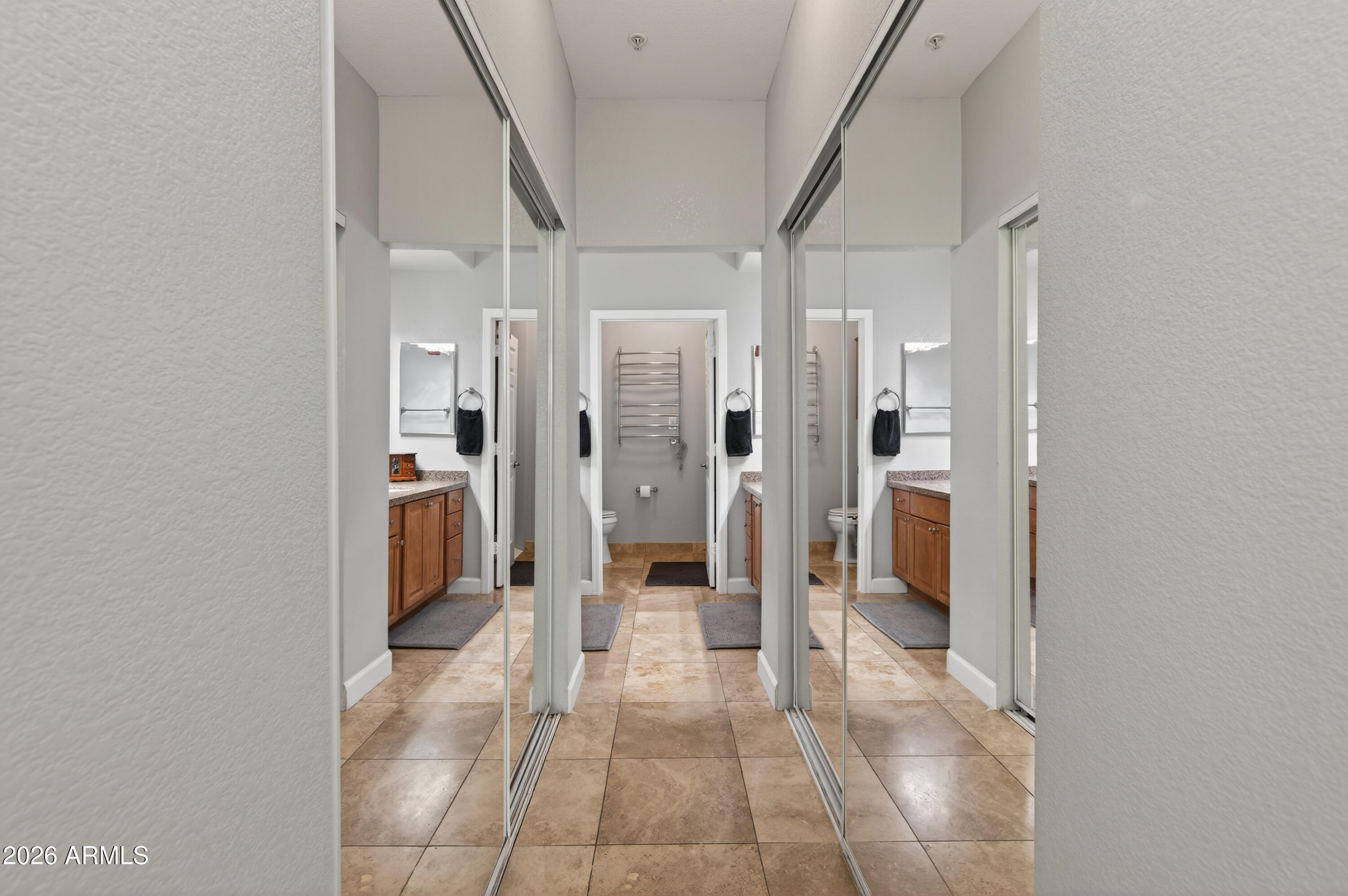 435 West Rio Salado Parkway, Unit 112 Tempe, AZ 85281 - Photo 20 of 38 a bathroom with a glass door shower a sink and a mirror
