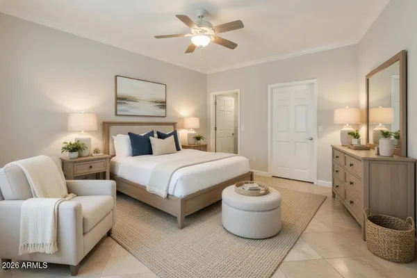a bedroom with a balcony a sink and a chandelier