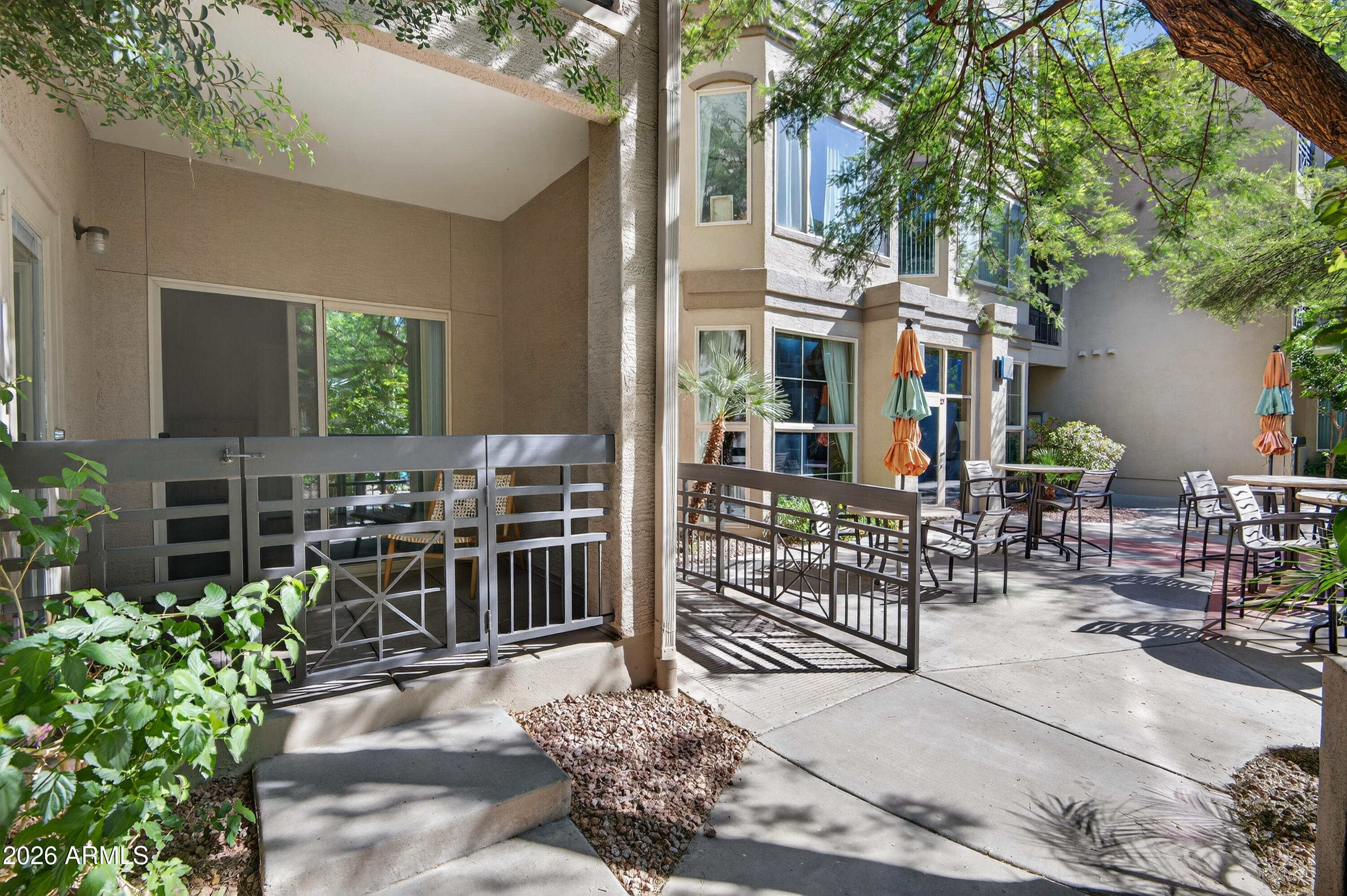 435 West Rio Salado Parkway, Unit 112 Tempe, AZ 85281 - Photo 32 of 36 a view of a chairs and table in the patio