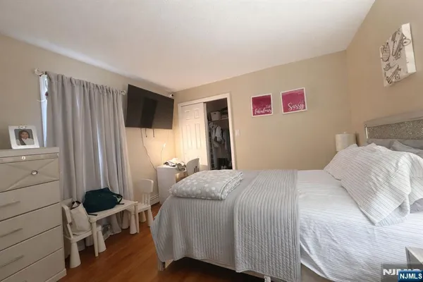 a bedroom with a bed and furniture