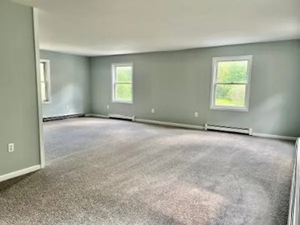 an empty room with windows