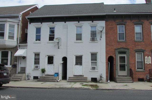 222 Baltimore Street Hanover, PA 17331 - Photo 2 of 18 a front view of a house with stairs