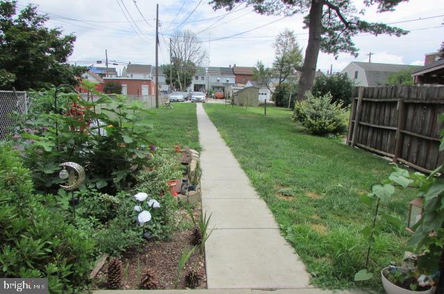 222 Baltimore Street Hanover, PA 17331 - Photo 3 of 18 a backyard of a house with lots of green space