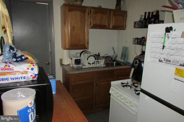 222 Baltimore Street Hanover, PA 17331 - Photo 6 of 18 a bathroom with a sink and a mirror