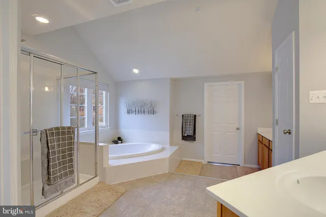 a view of a yard with trees in front of it