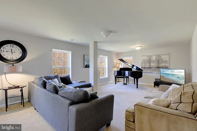 a view of a lake with a house in the background