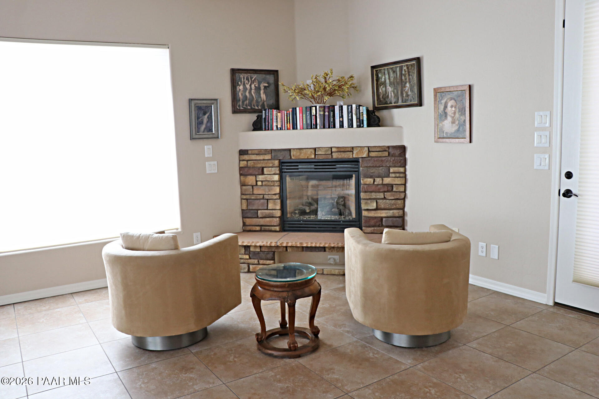 7051 Dillon Wash Road Prescott, AZ 86305 - Photo 19 of 31 a living room with furniture and a fireplace