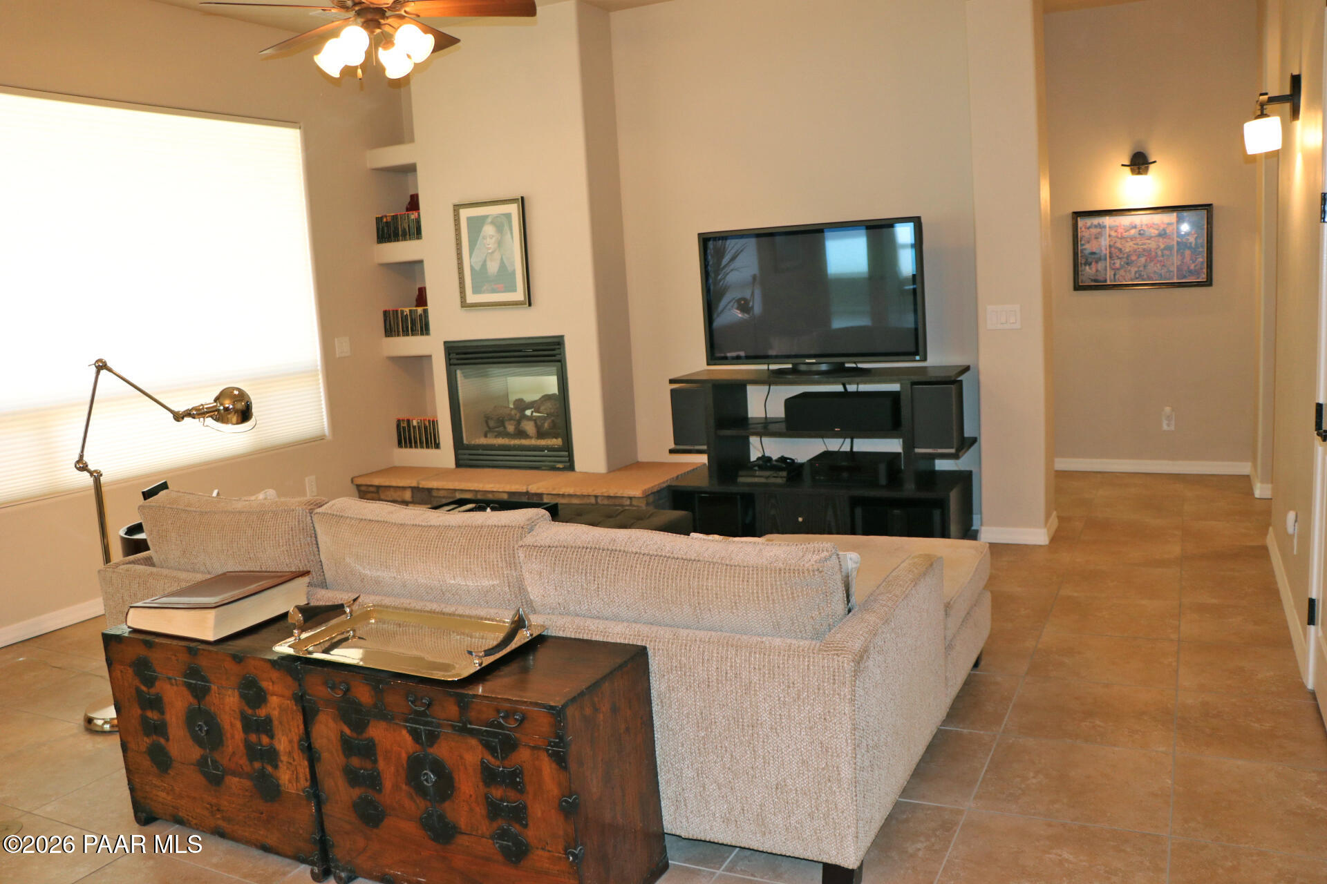 7051 Dillon Wash Road Prescott, AZ 86305 - Photo 25 of 31 a living room with furniture and a flat screen tv