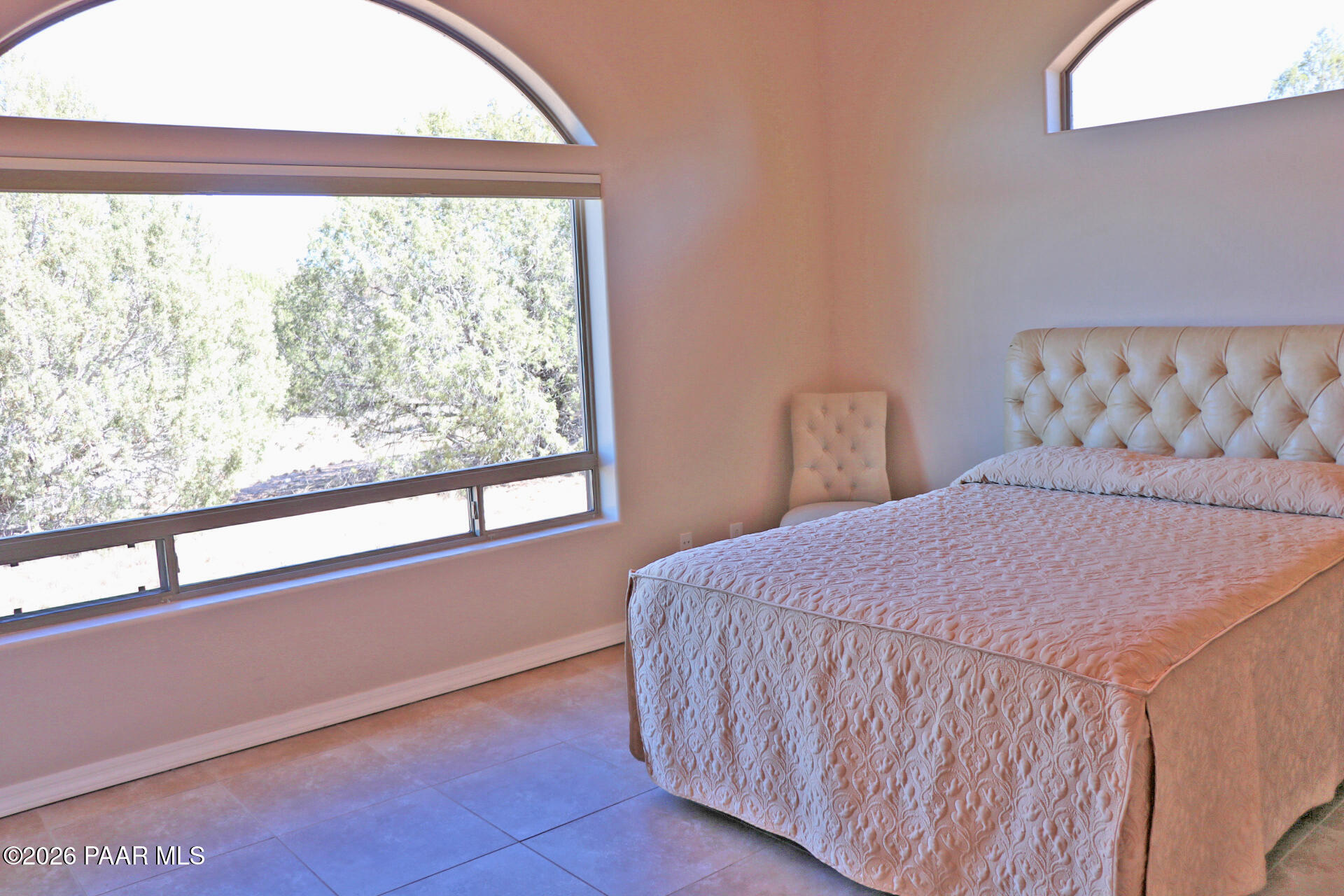 7051 Dillon Wash Road Prescott, AZ 86305 - Photo 26 of 31 a bedroom with a bed and a window