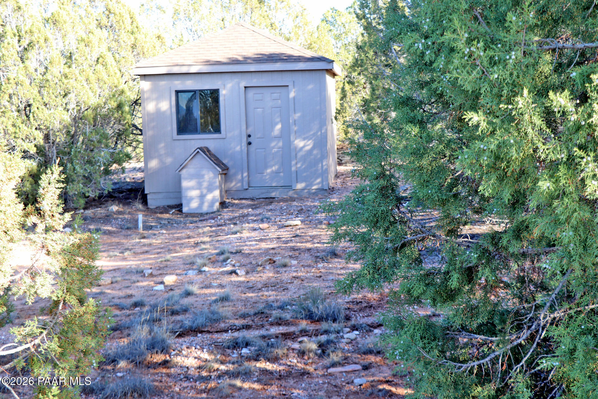 7051 Dillon Wash Road Prescott, AZ 86305 - Photo 31 of 31 a view of a house with a yard