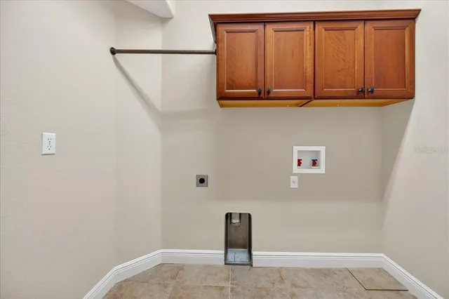 a view of storage and utility room with washer and dryer