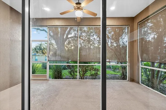 a view of a room with a large window