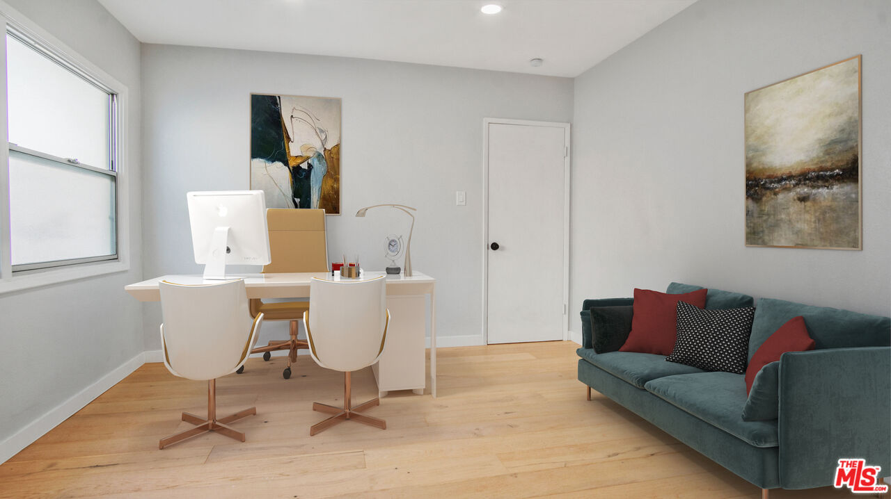 1610 East Carson Street, Unit 3 Long Beach, CA 90807 - Photo 8 of 21 a living room with a couch and a window