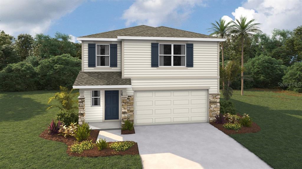 5085 Southwest 51st Road Gainesville, FL 32608 - Photo 1 of 1 a front view of a house with a yard and garage