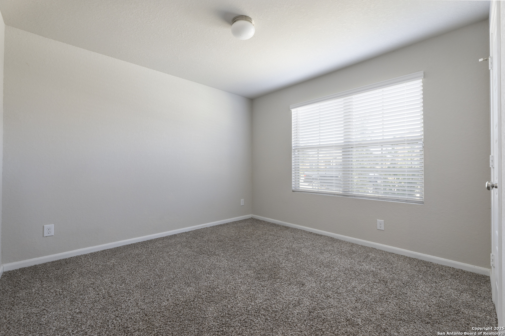 765 Stonemanor Bay Seguin, TX 78155 - Photo 18 of 29 an empty room with windows