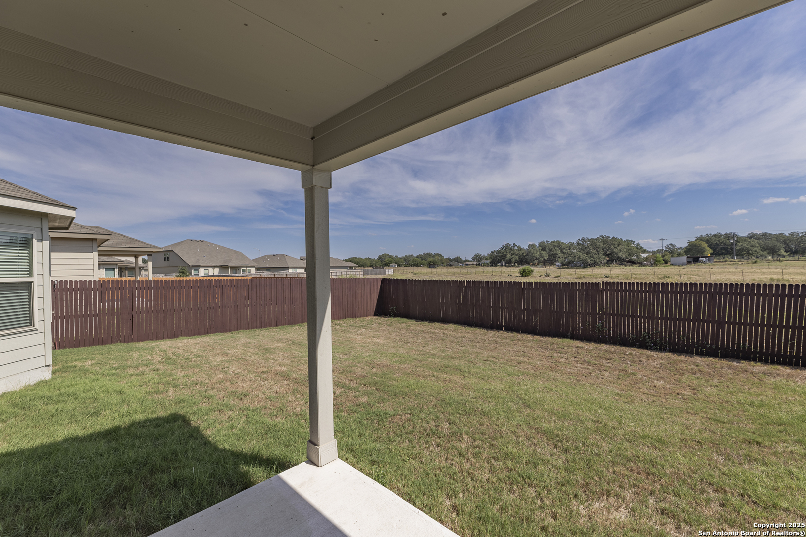 765 Stonemanor Bay Seguin, TX 78155 - Photo 24 of 29 a view of a balcony with a yard