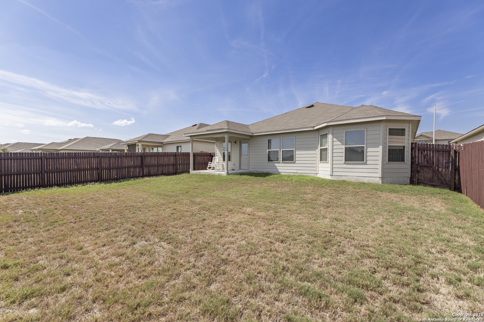 765 Stonemanor Bay Seguin, TX 78155 - Photo 25 of 29 a front view of a house with a yard