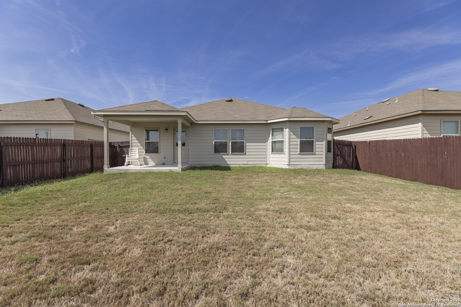 765 Stonemanor Bay Seguin, TX 78155 - Photo 26 of 29 a front view of a house with a garden
