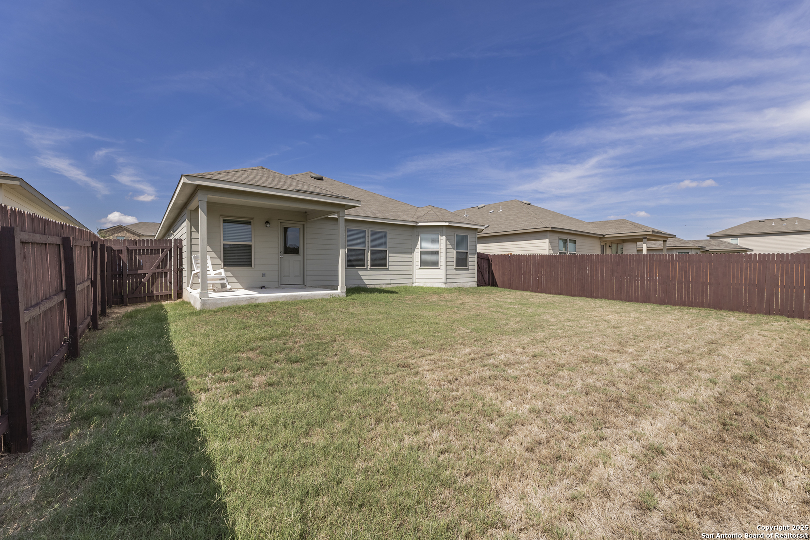 765 Stonemanor Bay Seguin, TX 78155 - Photo 27 of 29 a front view of a house with a yard