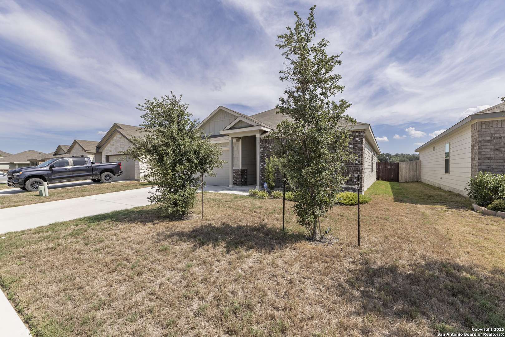 765 Stonemanor Bay Seguin, TX 78155 - Photo 29 of 29 a view of a house with a yard