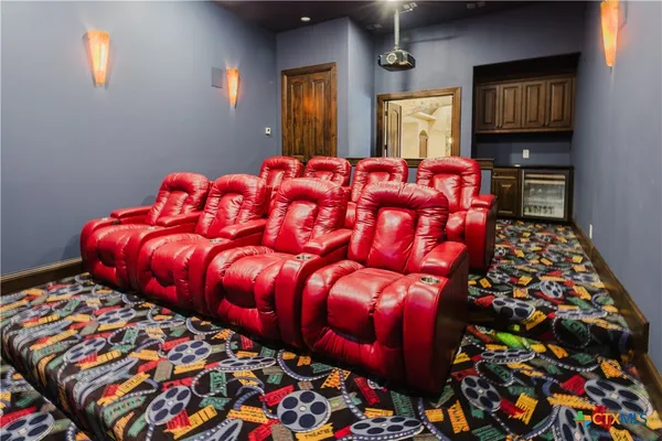 a bedroom with bed and wooden floor