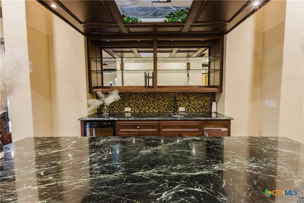 a living room with a couch and a table