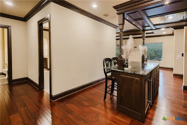 a dining room with wooden floor