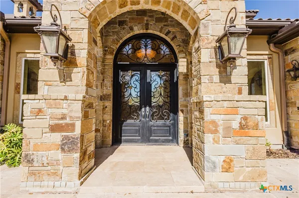 a front view of a building with a glass door