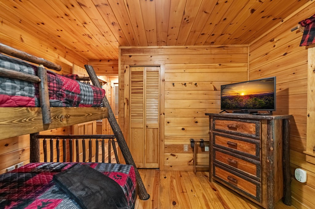 77 Old Covered Bridge Road Cherry Log, GA 30522 - Photo 39 of 96 lower level bedroom with bunks