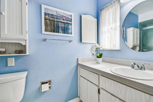 an aerial view of residential building with lake view