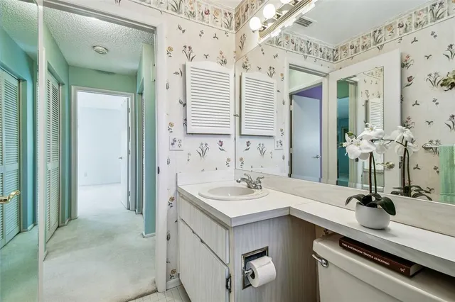 an aerial view of a house with outdoor space