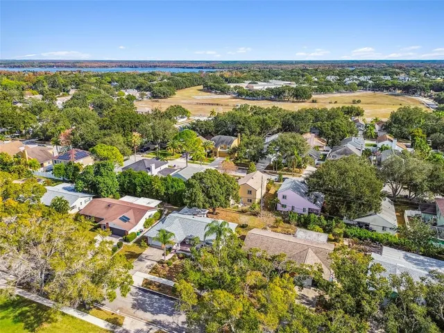 a view of swimming pool with a yard