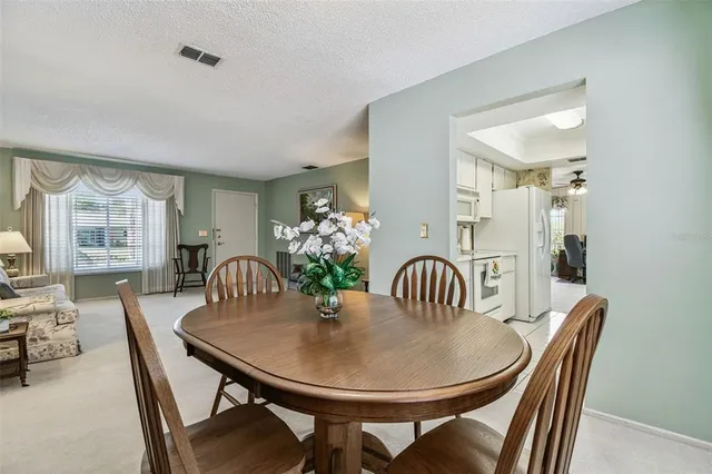 a workspace with furniture and a window