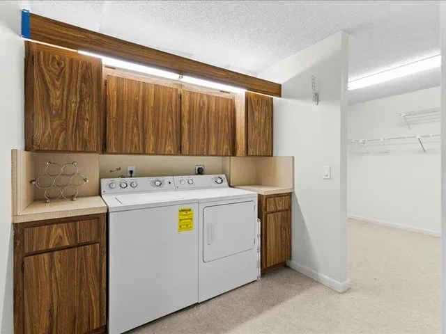 a terrace with outdoor seating and city view