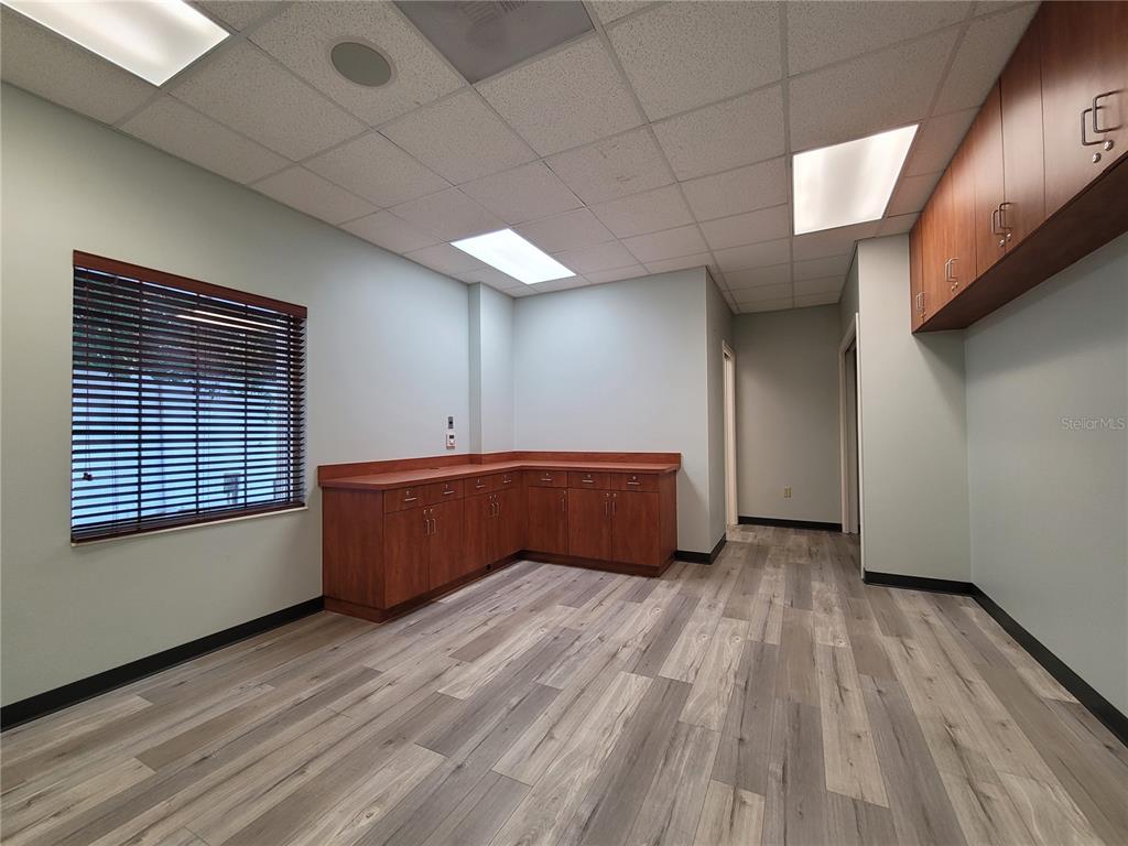 37302 Pure Water Way Zephyrhills, FL 33541 - Photo 5 of 9 a room with wooden floor and window