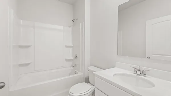a bathroom with a sink toilet and bathtub