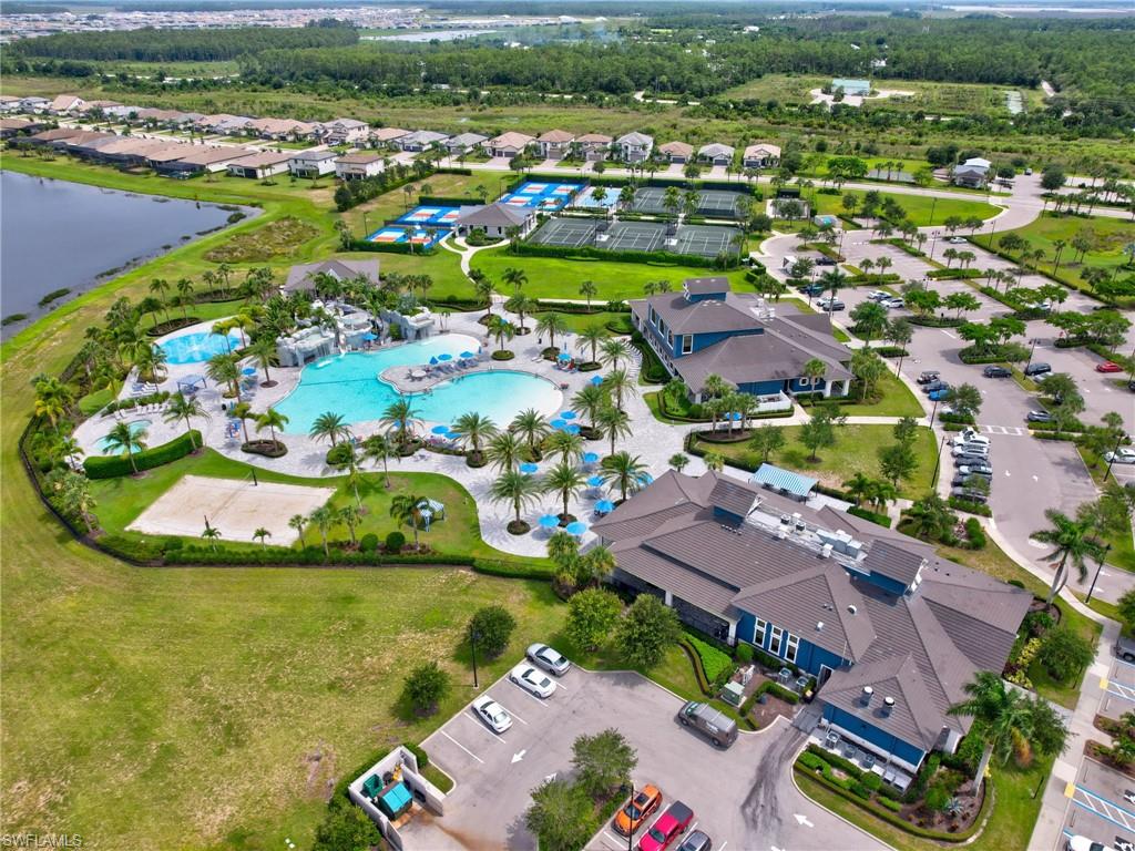 19952 Beverly Park Road Estero, FL 33928 - Photo 24 of 32 an aerial view of residential houses with outdoor space and river view