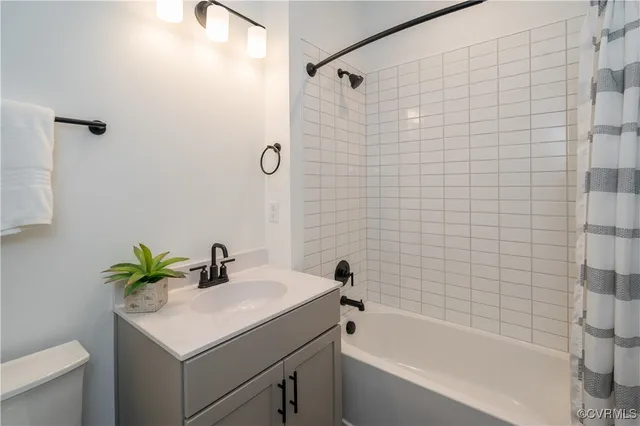 a bathroom with a sink a bathtub and a shower