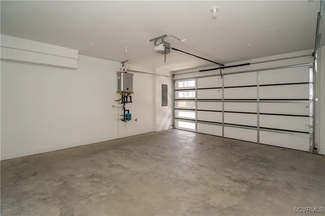 a bathroom with a toilet a sink and a mirror