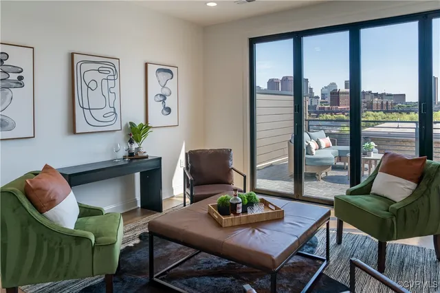 a living room with furniture and a window