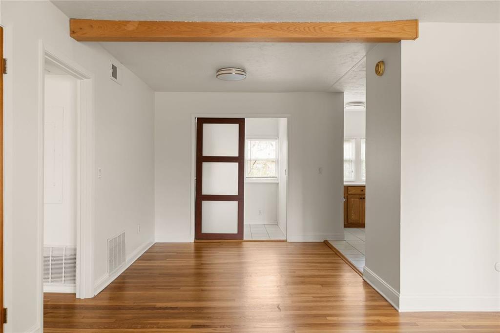 2941 Caldwell Road Northeast, Unit B4 Brookhaven, GA 30319 - Photo 12 of 51 a view of a hallway with wooden floor and closet