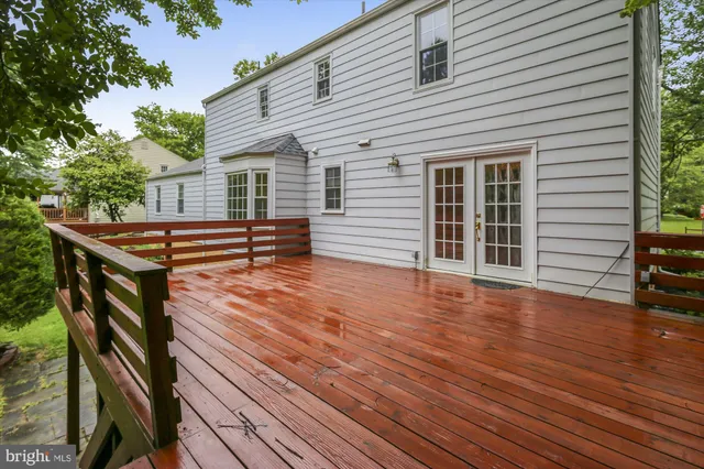 a view of outdoor space and deck with furniture