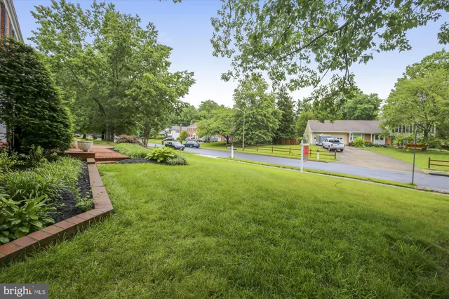 a view of a park with swings and slides