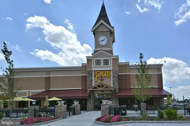 a view of a building with sitting area