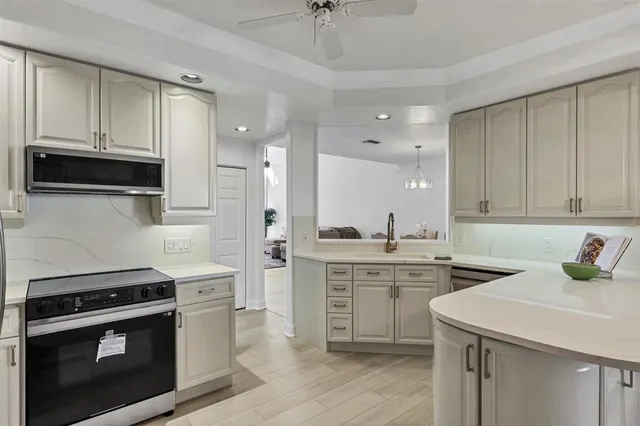 a spacious bedroom with a bed and a window