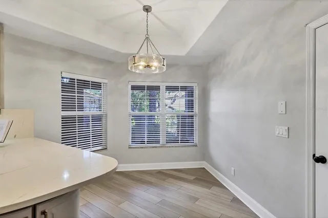 a bedroom with a bed and the view of bathroom