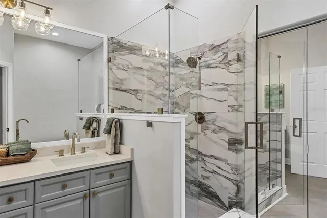 a view of hallway with stairs and wooden floor
