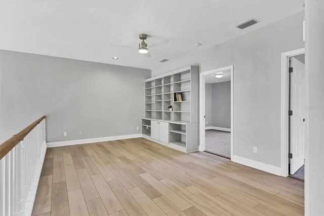 an empty room with windows